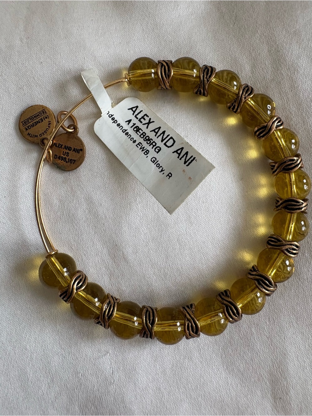 New with tag Alex and Ani Yellow Glass Bead Wire Bangle with Gold Accents